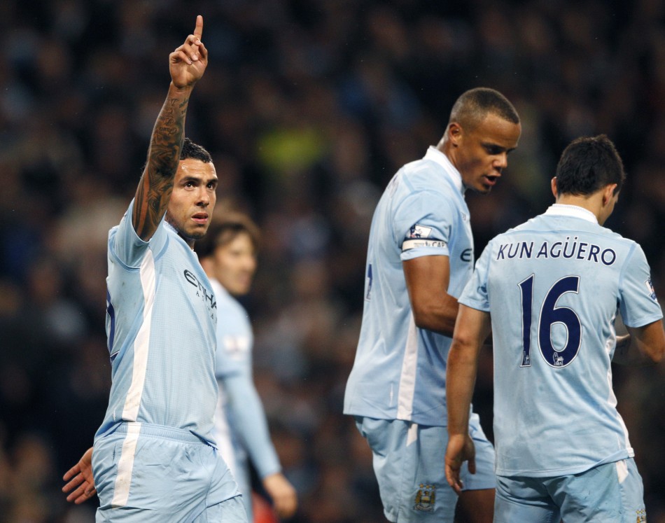 Manchester City039s Tevez celebrates his goal against West Bromwich Albion during their English Premier League soccer match in Manchester