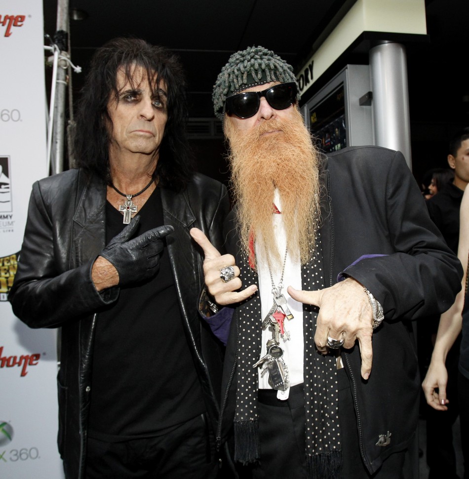 Musicians Alice Cooper L and Billy Gibbons pose as they arrive at the fourth annual Golden Gods awards at Nokia theatre in Los Angeles