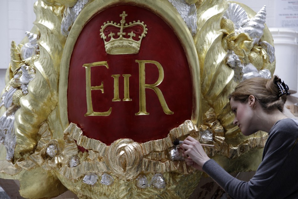 A City and Guilds student works on one of the decoration for the Diamond Jubilee Pageant Royal Barge at the London Art School in London