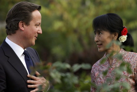 British PM Cameron chats with Nobel laureate and newly elected parliamentarian Aung San Suu Kyi at her residence in Yangon