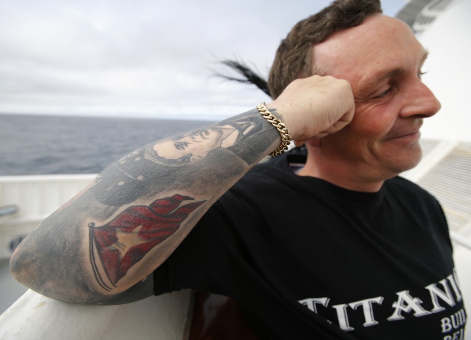 Derek Chambers of Belfast shows off tattoos of Titanics crew while onboard the Titanic Memorial Cruise in the mid-Atlantic Ocean