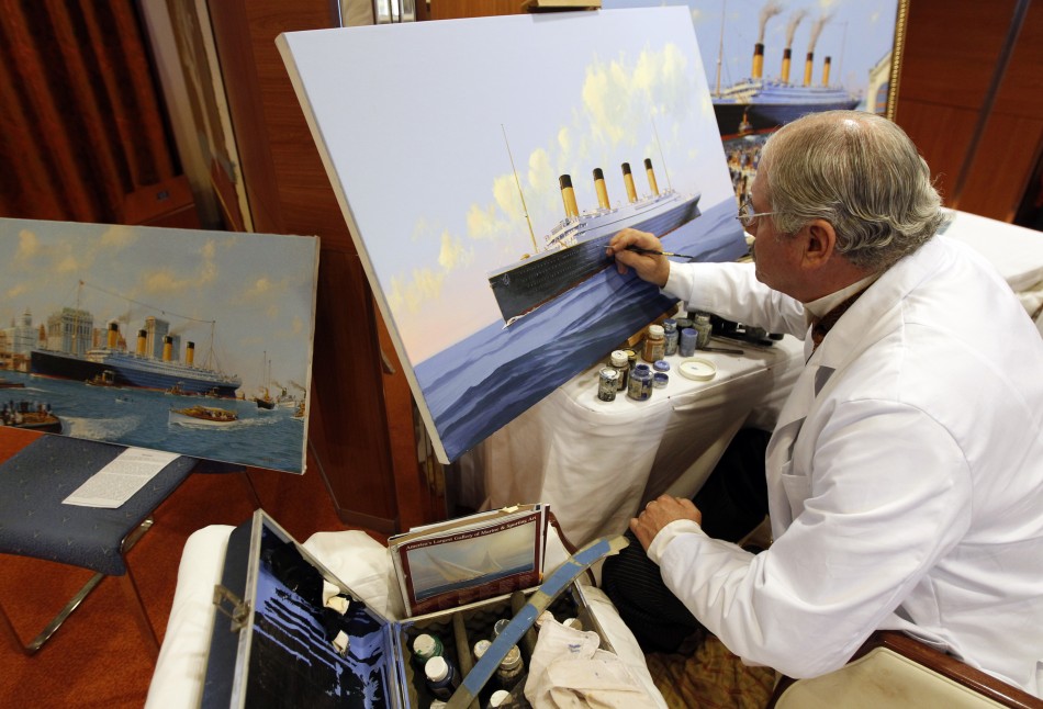 Maritime artist Flood of Florida paints the doomed Titanic liner as it would have appeared arriving in New York, onboard the Titanic Memorial Cruise in the mid-Atlantic Ocean