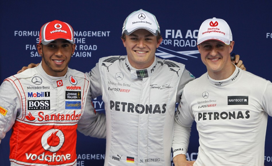 Mercedes Formula One driver Rosberg, McLaren039s Hamilton and Mercedes039Schumacher pose after the qualifying session of the Chinese F1 Grand Prix at Shanghai circuit
