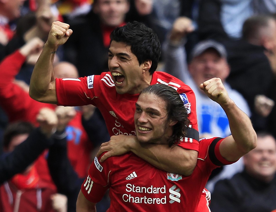 Liverpool039s Carroll celebrates his goal against Everton with teammate Suarez during their English FA Cup semi-final soccer match in London