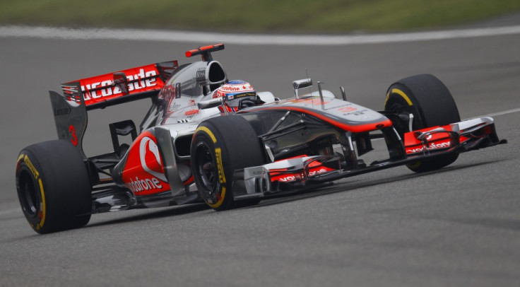 McLaren Formula One driver Button drives during the Chinese F1 Grand Prix at Shanghai circuit