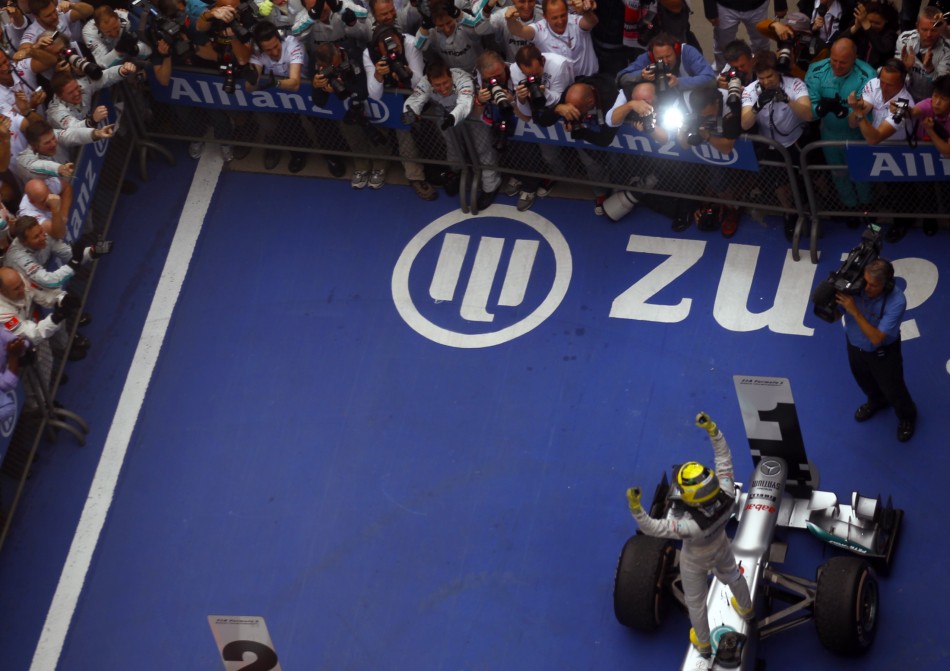 Mercedes Formula One driver Rosberg celebrates winning the Chinese F1 Grand Prix at Shanghai circuit