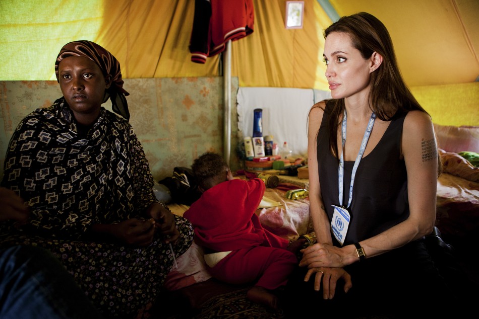 Handout shows UNHCR Goodwill Ambassador Jolie visiting Somali refugees at Shousha Camp, near the Tunis-Libyan border, at Ras Djir