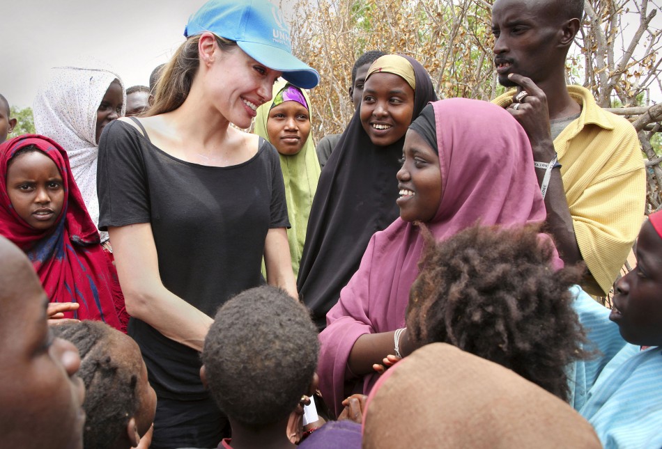 UNHCR Goodwill Ambassador and actress Jolie chats with children in the Dadaab refugee camp on the Kenya-Somali border