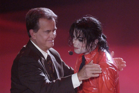 Singer Michael Jackson (R) is thanked by Dick Clark, host of &quot;American Bandstand's 50th...A Celebration&quot; after performing &quot;Dangerous&quot; for the show in Pasadena, California, April 20, 2002.