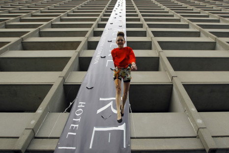 Revere Hotel Vertical Fashion Show: Models Scale 24 Stories Face First