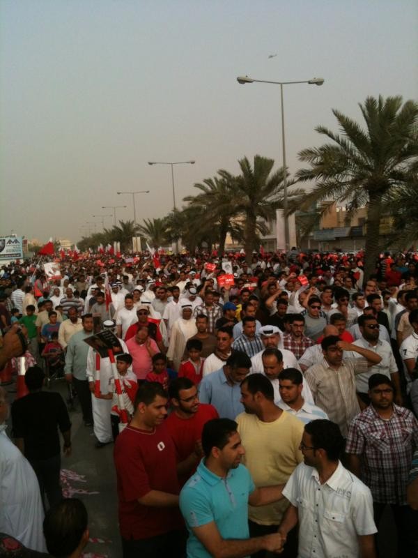 Protesters march towards the Formula One Grand Prix circuit in Bahrain