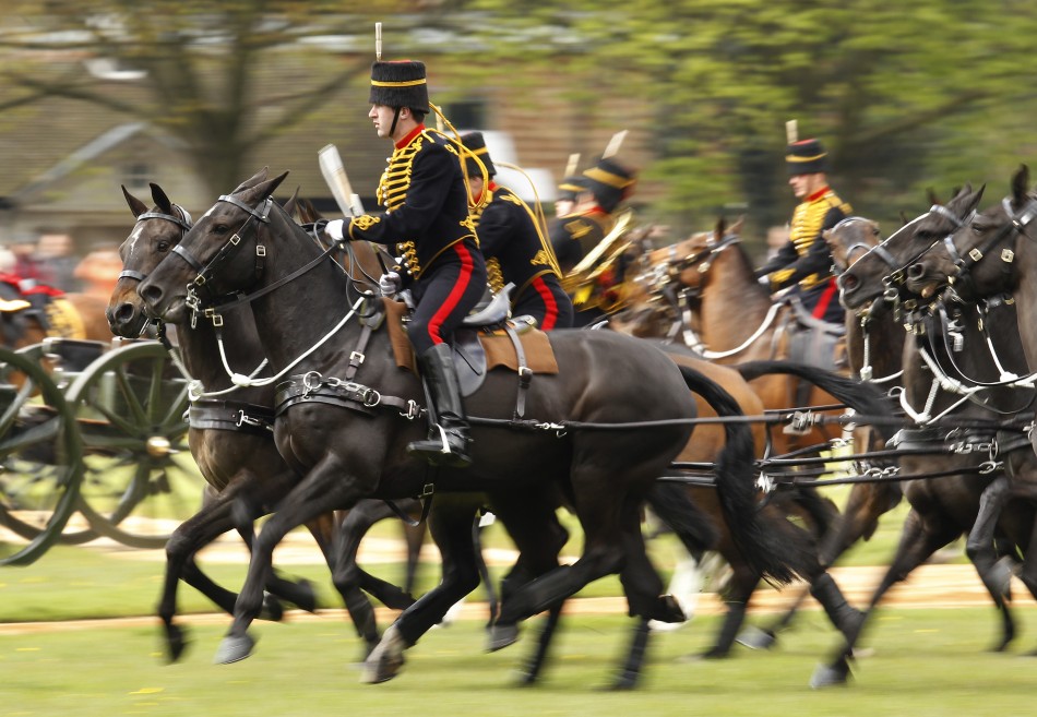 Gunners from the King039s Troop Royal Horse Artillery arrive to fire a forty-one gun salute in Hyde Park, central London