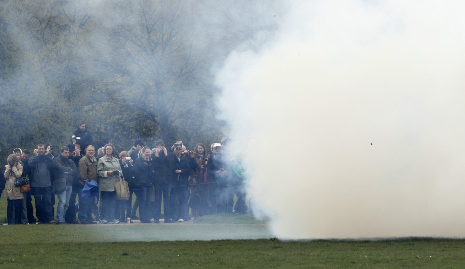 People watch as gunners from The King039s Troop Royal Horse Artillery fire a forty-one gun salute in London