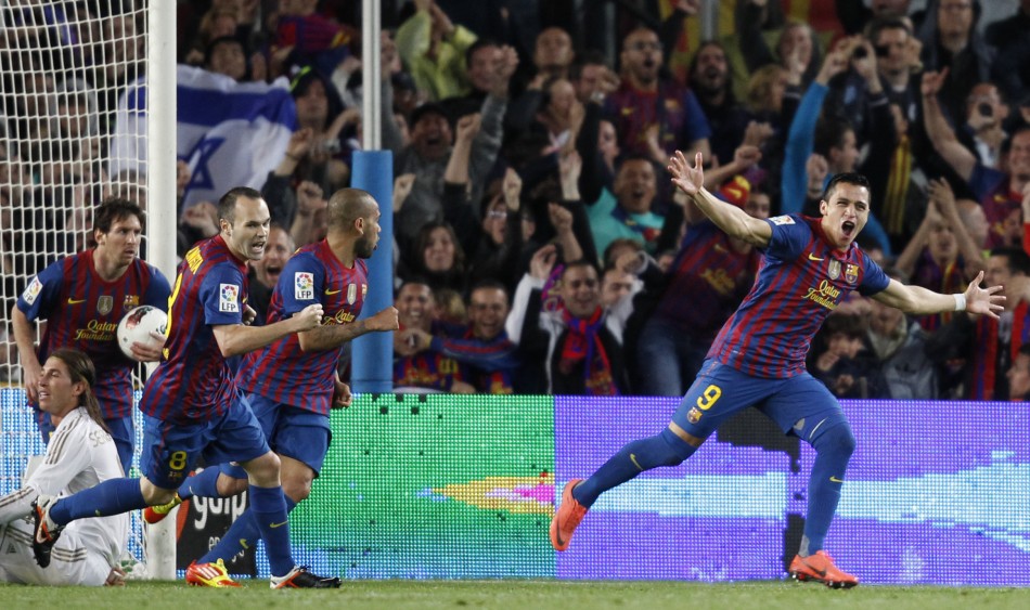 Barcelona039s Alexis celebrates after scoring against Real Madrid during their Spanish first division soccer match against Real Madrid in Barcelona
