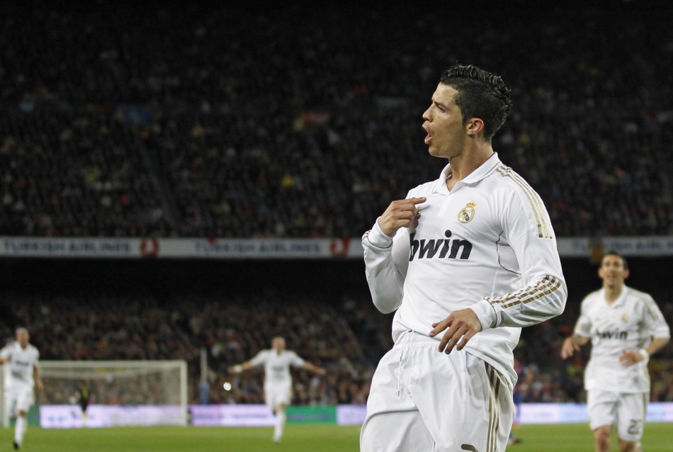 Real Madrid039s Cristiano Ronaldo celebrates after scoring against Barcelona during their Spanish first division soccer match in Barcelona
