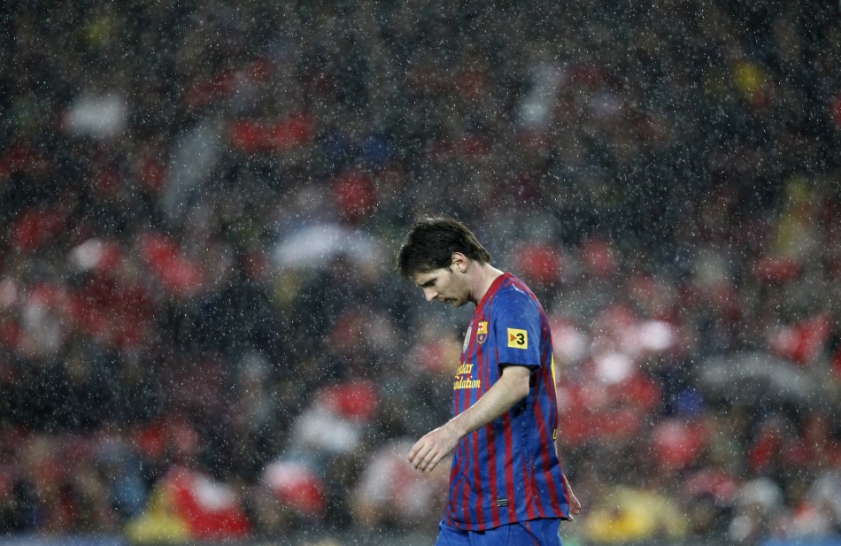 Barcelona039s Messi walks off the pitch at the end of their Spanish first division soccer match against Real Madrid in Barcelona