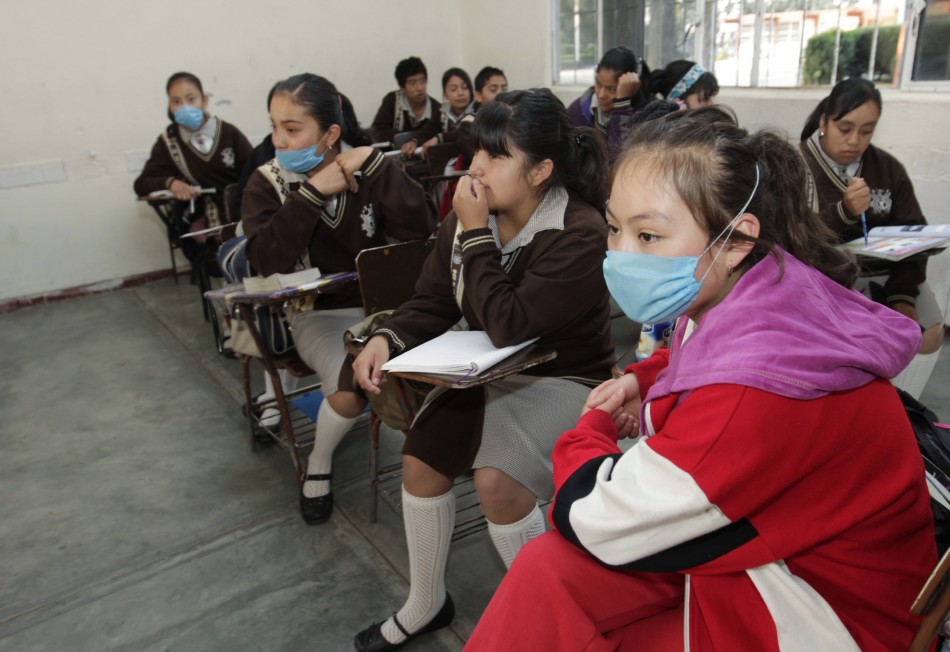 Some students wearing surgical masks