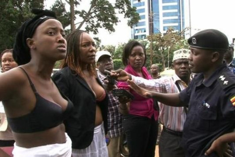 A group of Ugandan women stripped to their bras to protest against the alleged sexual assault of Ingrid Turinawe