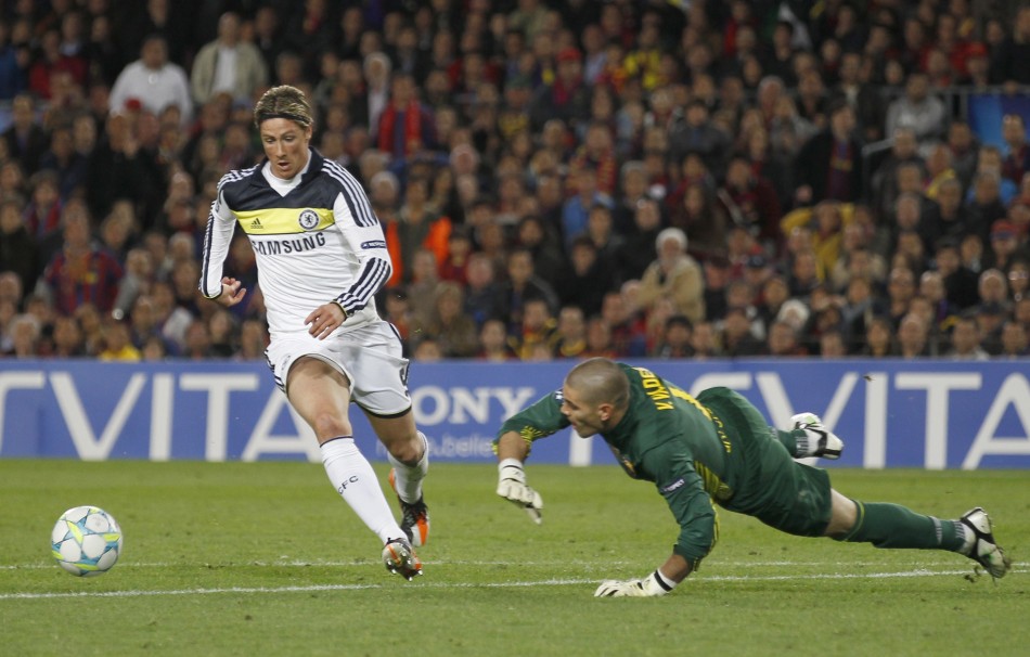 Chelsea039s Fernando Torres shoots to score past Barcelona039s goalkeeper Victor Valdes during their Champions League semi-final second leg soccer match at Camp Nou stadium in Barcelona