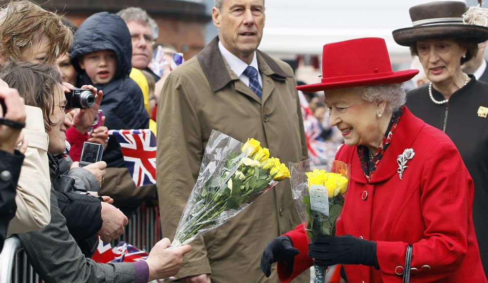 Queen in Regal Red as She Reopens Cutty Sark