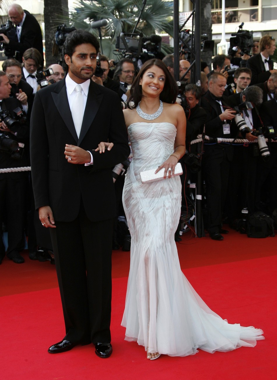 Bollywood star Abhishek Bachchan and his wife, Bollywood actress Aishwarya Rai arrive for an evening gala screening of Chinese director Wong Kar Wais in-competition film quotMy Blueberry Nightsquot at the 60th Cannes Film Festival 2007