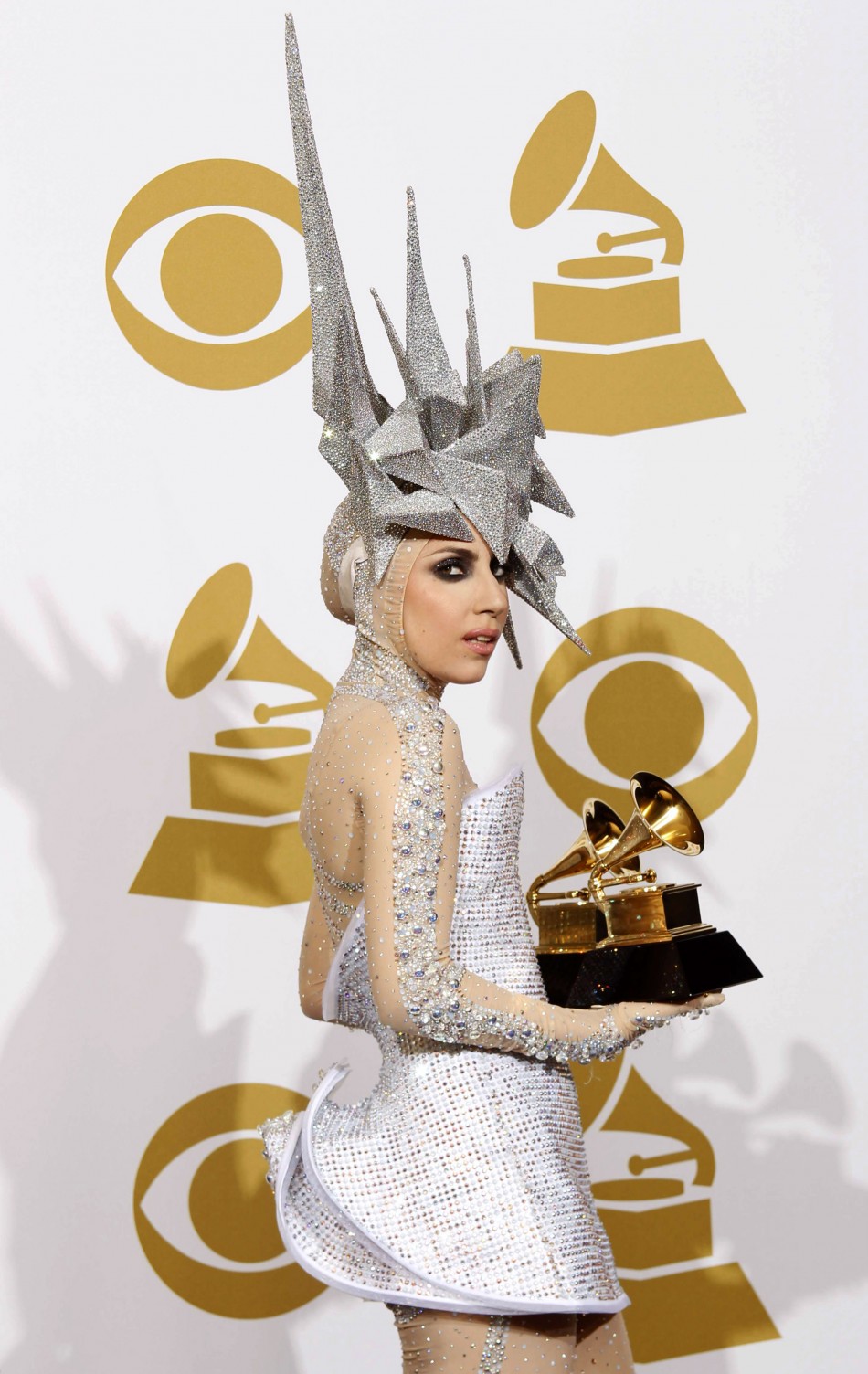 Lady Gaga holds her two Grammy awards at the 52nd annual Grammy Awards in Los Angeles