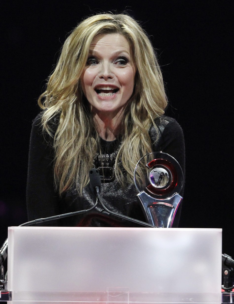 Michelle Pfeiffer accepts the Cinema Icon Award during the CinemaCon Big Screen Achievement Awards show in Las Vegas