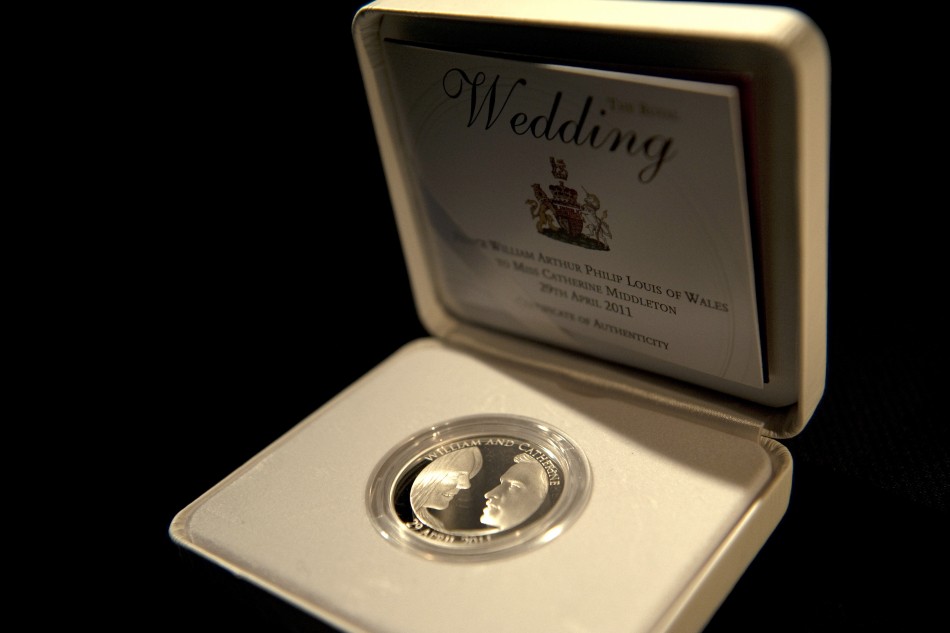 A packaged five pound Royal Wedding commemorative coin is seen at the Royal Mint in Cardiff