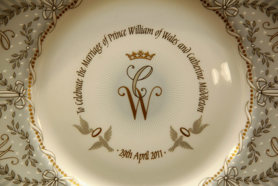 Official Royal Wedding commemorative china is displayed at the Queens Gallery shop on Buckingham Palace Road, in central London