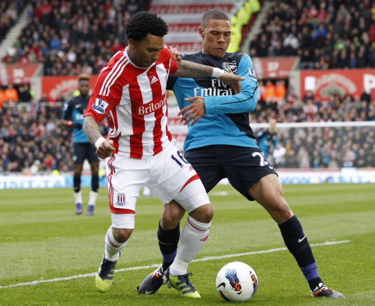 Kieran Gibbs and Jermaine Pennant Battle for the Ball