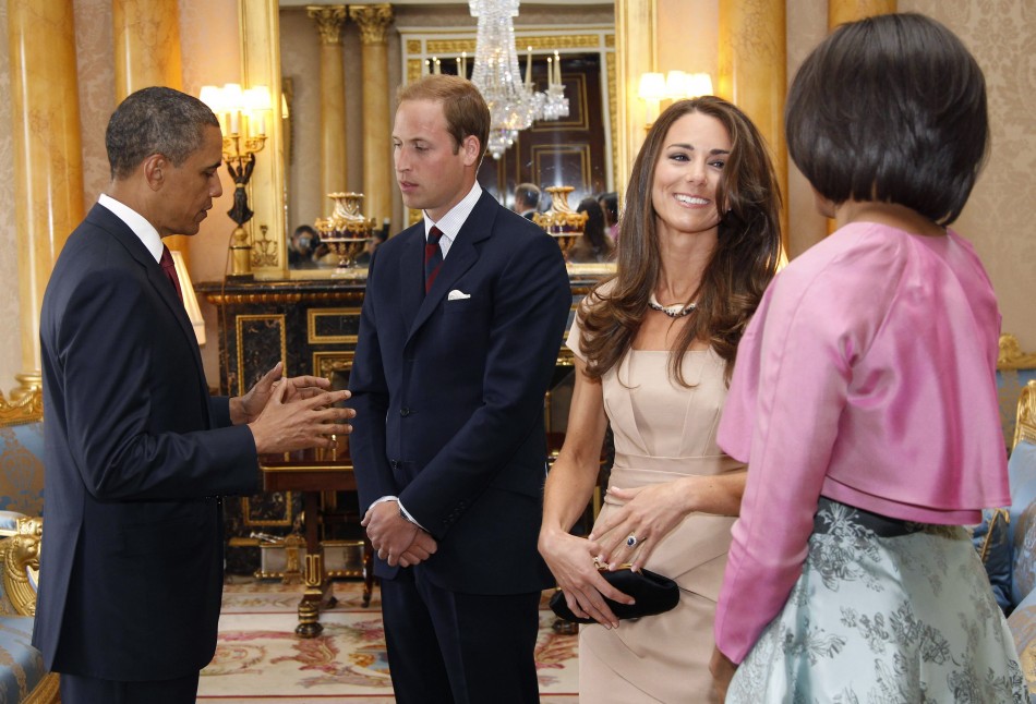 U.S. President Barack Obama and first lady Michelle Obama talk to Britains Prince William and Catherine, Duchess of Cambridge at Buckingham Palace, in London