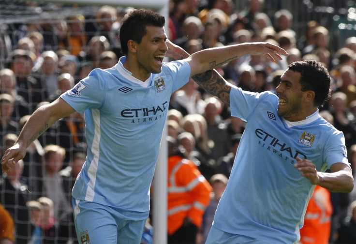 Sergio Aguero (L) and Carlos Tevez