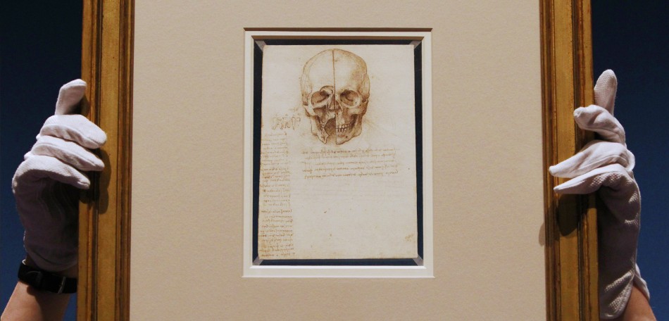 An employee poses with artist Leonardo da Vinci039s drawing quotA skull sectioned, 1489quot at the Queen039s Gallery at Buckingham Palace in London