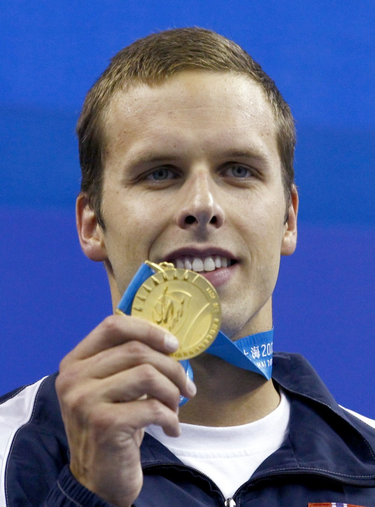 Alexander Dale Oen displays gold medal won in men's 100m breaststroke final at Fina World Championships last year in Shanghai