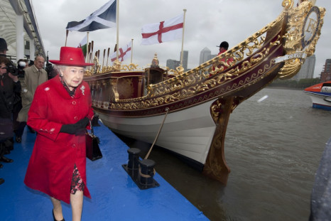 The Queen takes a look at the Gloriana, a new royal barge that will form part of the Thames diamond jubilee pageant
