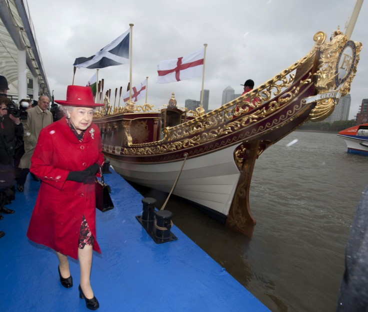 The Queen takes a look at the Gloriana, a new royal barge that will form part of the Thames diamond jubilee pageant
