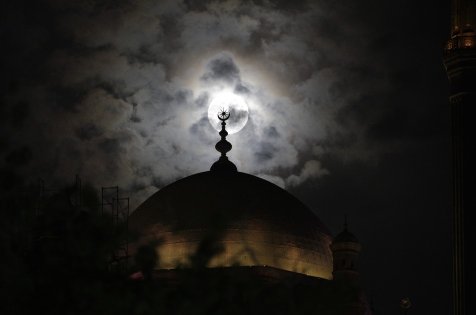 A full moon is seen in Cairo