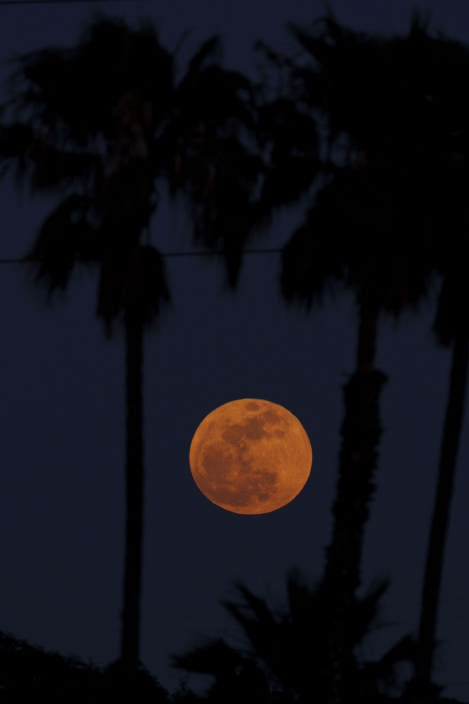 The Super Moon rises in Inglewood