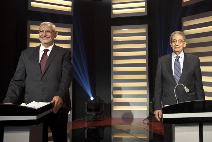 Egyptian presidential hopefuls Amr Moussa and Abdel Moneim Abol Fotouh take part in a televised debate in Cairo