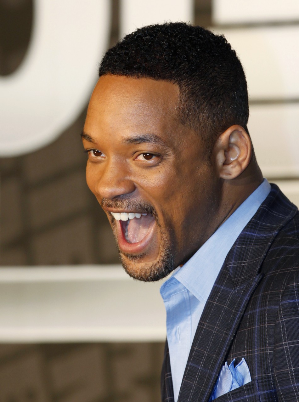 Cast member Will Smith shouts as he arrives for a news conference to promote his film quotMen in Black IIIquot in Seoul