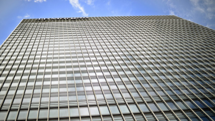 Sun reflects off the JPMorgan headquarters at Canary Wharf in London May 11, 2012.