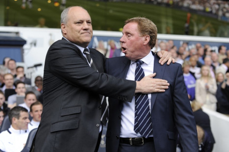 Fulham manager Martin Jol greets Tottenham Hotspur manager Harry Redknapp before their English Premier League match at White Hart Lane