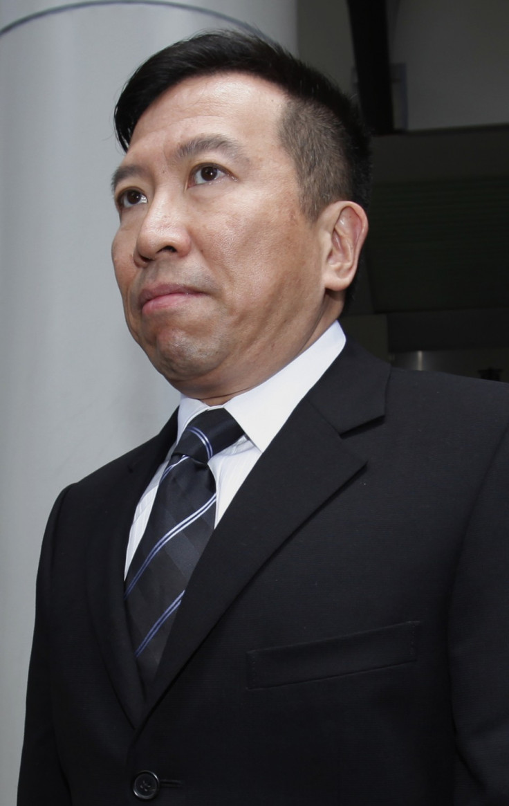 Feng shui master Tony Chan leaves court in Hong Kong