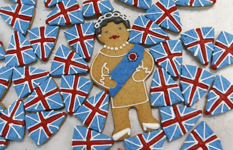 Biscuits depicting Britains Queen Elizabeth and the Union flag sit on trays at Biscuiteers in London