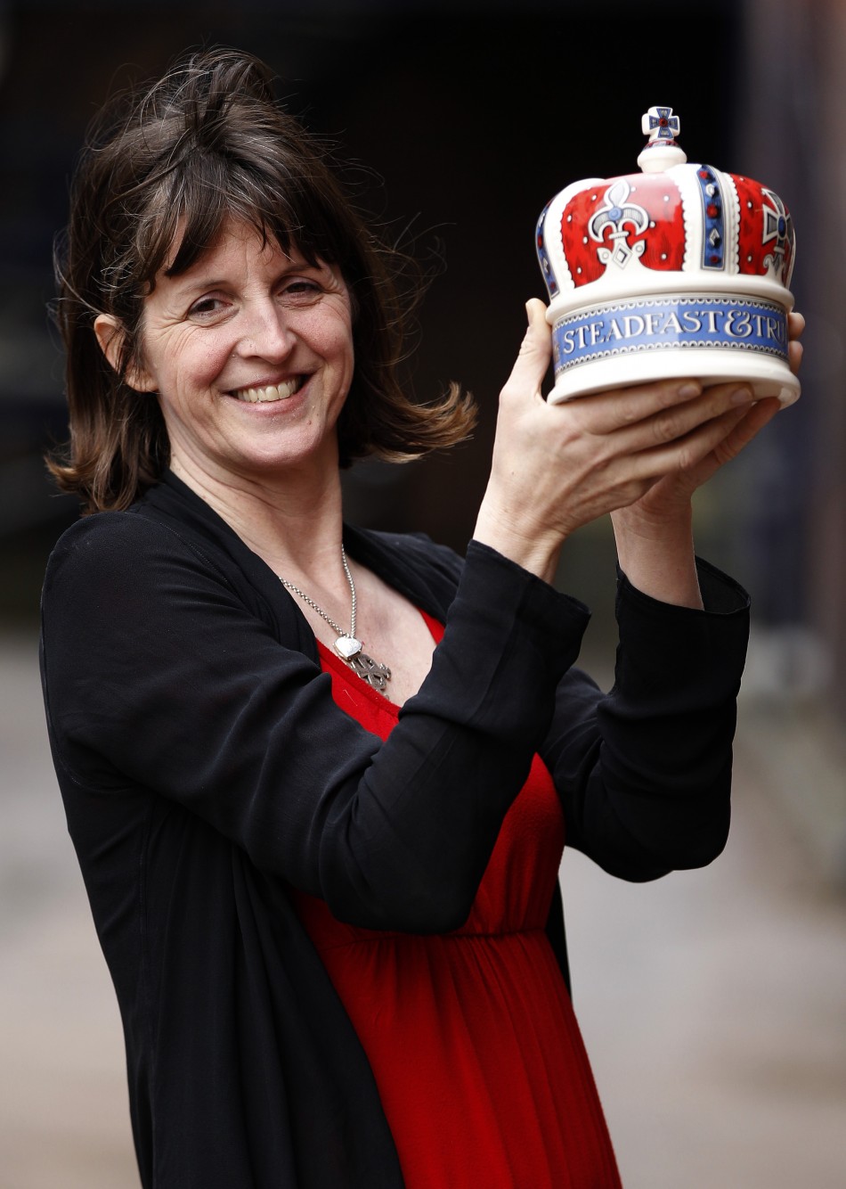Emma Bridgewater poses with a crown shaped pot, part of her Diamond Jubilee Collection, at the Emma Bridgewater pottery factory in Stoke-On-Trent