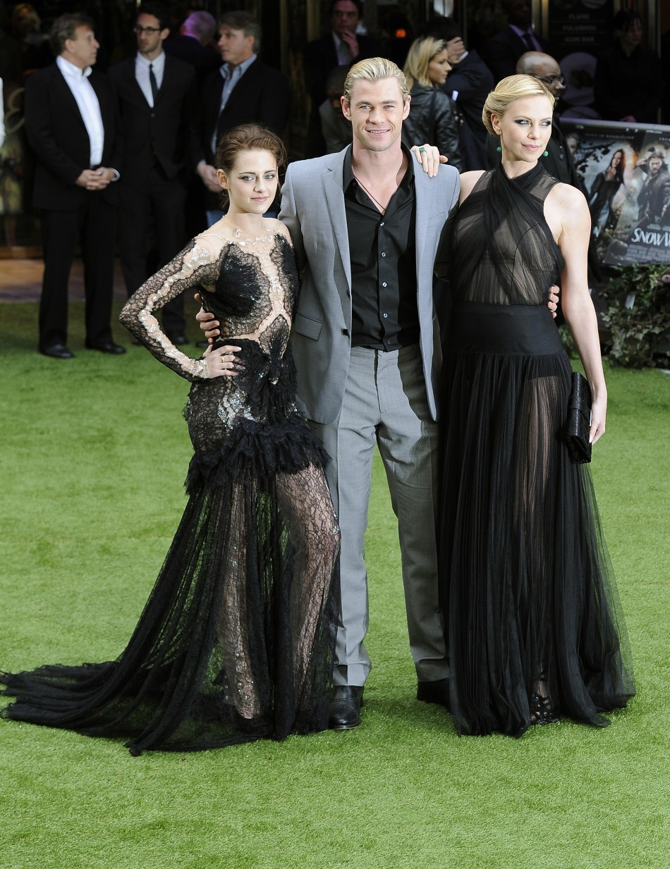 Actors Stewart, Hemsworth and Theron pose for photographers as they arrive for the world premiere of quotSnow White and the Huntsmanquot at Leicester Square in London