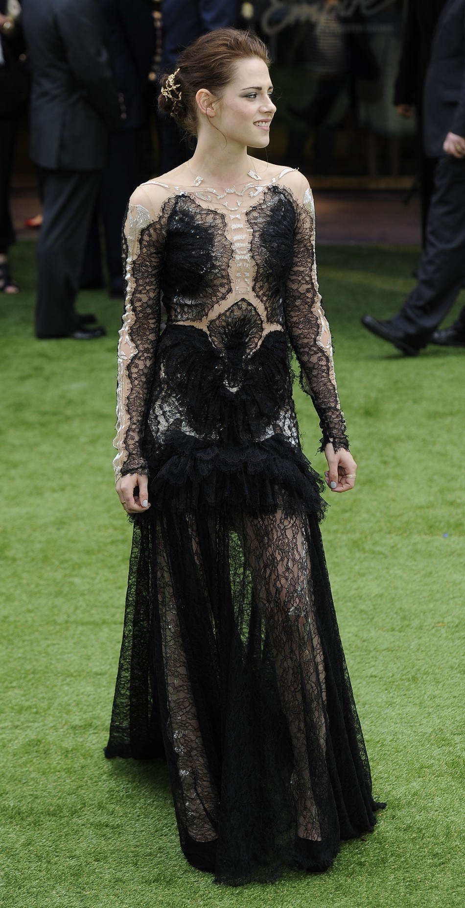 Actress Kristen Stewart poses for photographers as she arrives for the world premiere of quotSnow White and the Huntsmanquot at Leicester Square in London