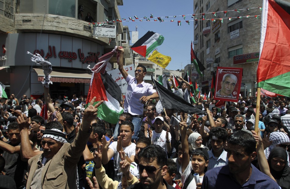 Palestinians take part in a rally marking Nakba in Ramallah