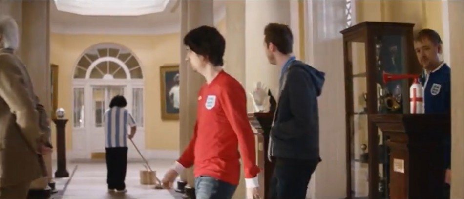 On their way to the forecourt, a man with a classic Maradona hair-do and an Argentina football shirt can clearly be seen mopping the floors.