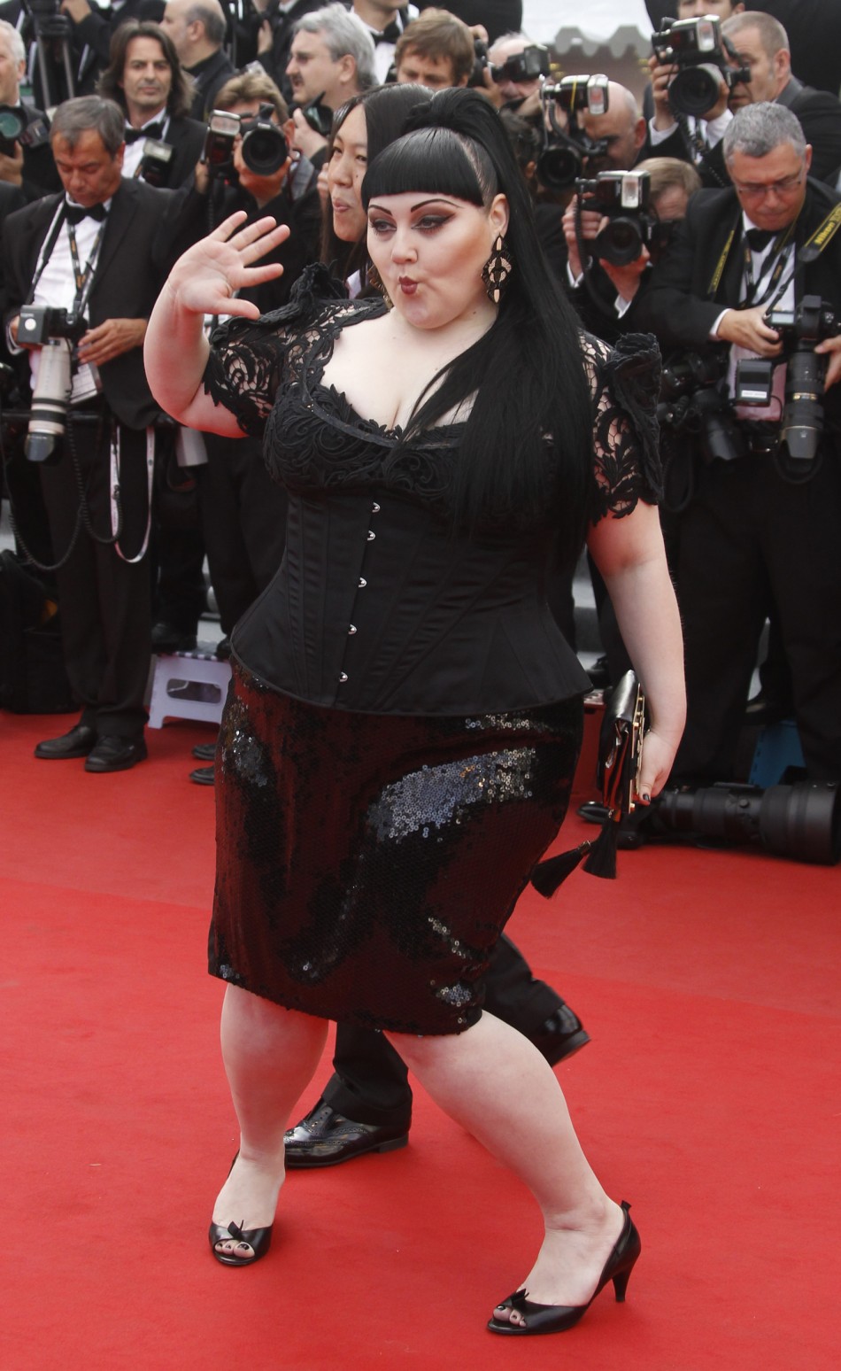 Singer Ditto arrives on the red carpet for the screening of the film De rouille et dos at the 65th Cannes Film Festival